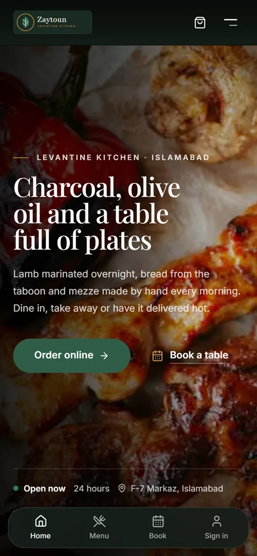 Restaurant website on a phone with bottom navigation for home, menu, booking and sign-in